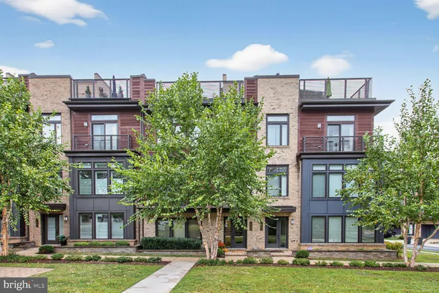 a front view of a building with garden