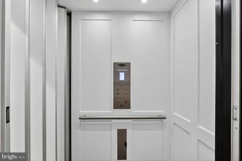 a living room with furniture window and a table