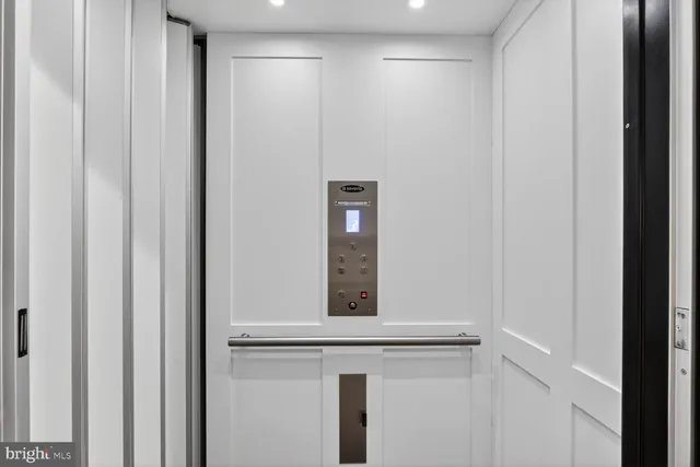 a living room with furniture window and a table