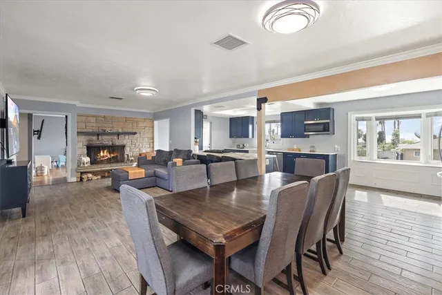 a view of kitchen dining table and chairs