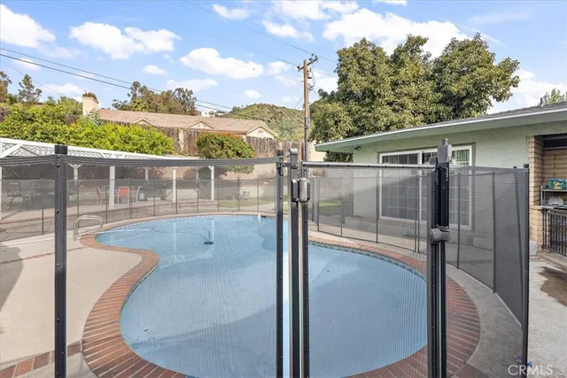 a view of a tables and chairs in patio