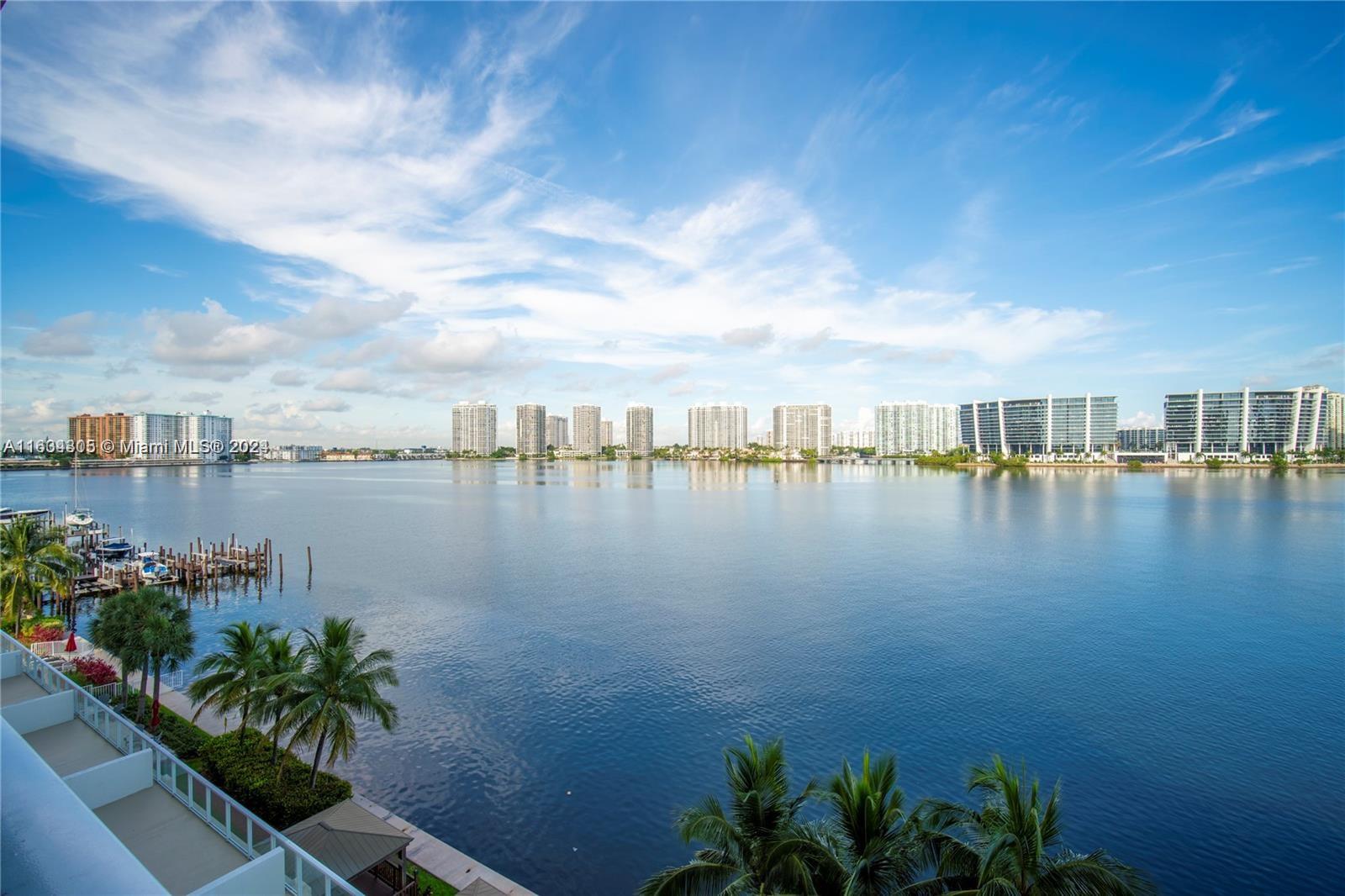 a view of a lake with a city view