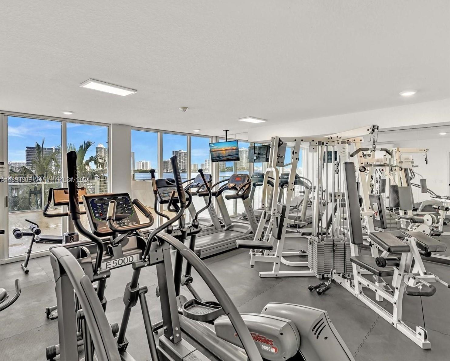 18100 North Bay Road, Unit 606 Sunny Isles Beach, FL 33160 - Photo 27 of 30 a view of a room with gym equipment