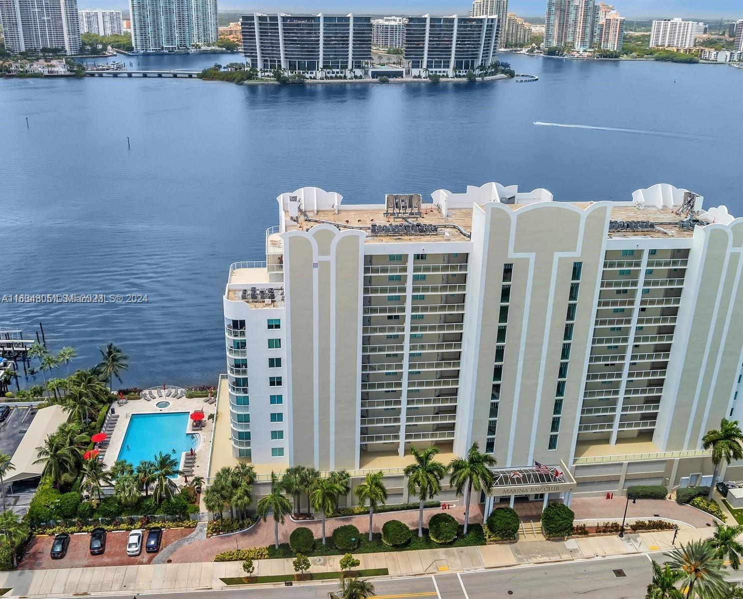18100 North Bay Road, Unit 606 Sunny Isles Beach, FL 33160 - Photo 30 of 30 a front view of a building with lake view