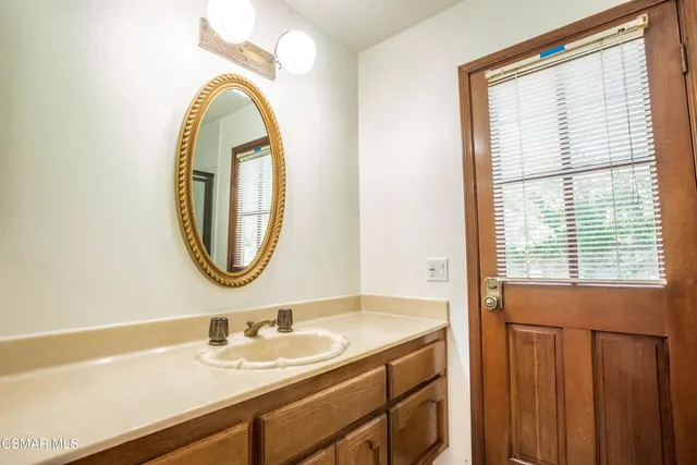 a view of a backyard with pathway