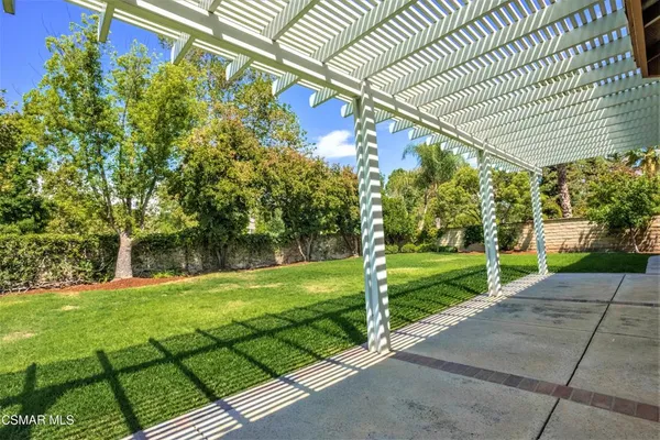 a view of a big room with windows