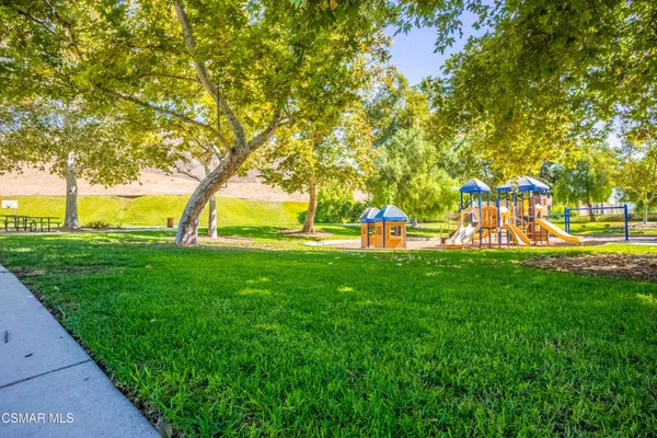 a garden view with a fountain
