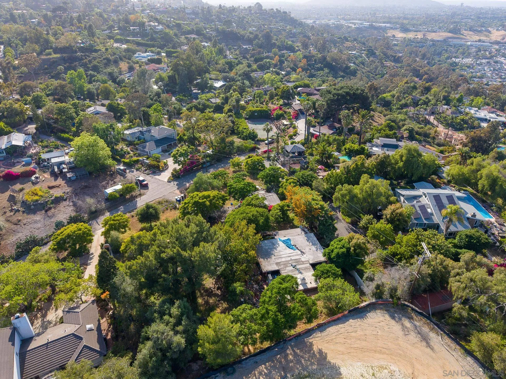 5025 Crestland Drive La Mesa, CA 91941 - Photo 12 of 19 an aerial view of residential houses with outdoor space and trees