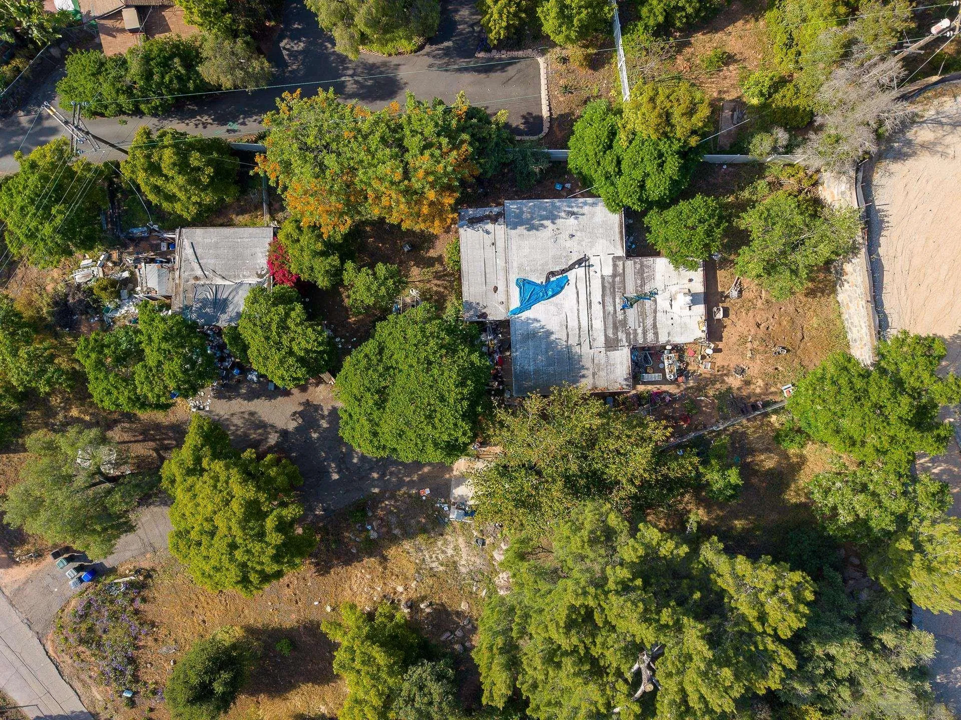 5025 Crestland Drive La Mesa, CA 91941 - Photo 2 of 19 an aerial view of a house with a yard and garden