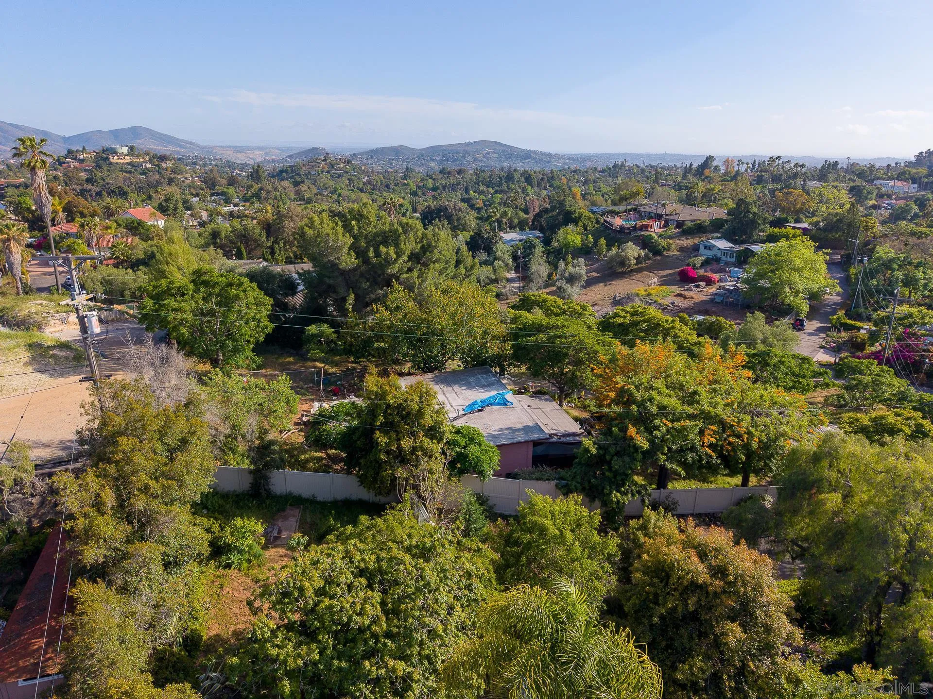 5025 Crestland Drive La Mesa, CA 91941 - Photo 8 of 19 an aerial view of a houses with a yard