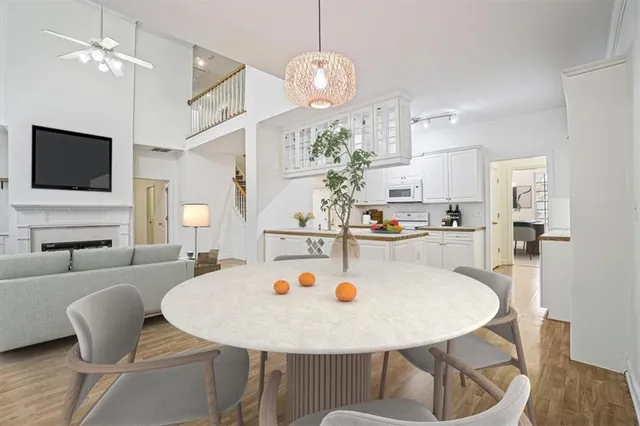 a view of kitchen with dining table and chairs