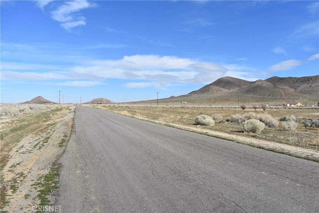 9100 Hamilton Road Rosamond, CA 93560 - Photo 1 of 1 a view of an ocean beach and mountain