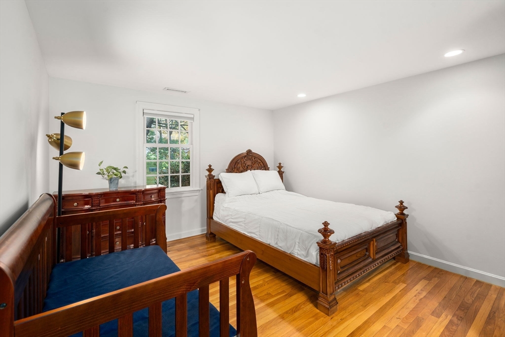 8 Jericho Road, Unit 8 Weston, MA 02493 - Photo 13 of 19 a bed room with a bed and a window