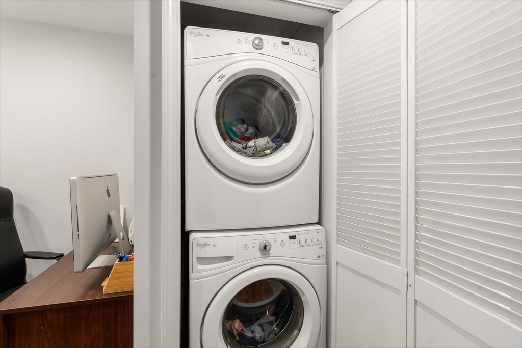 8 Jericho Road, Unit 8 Weston, MA 02493 - Photo 18 of 19 a view of a hallway with washer and dryer