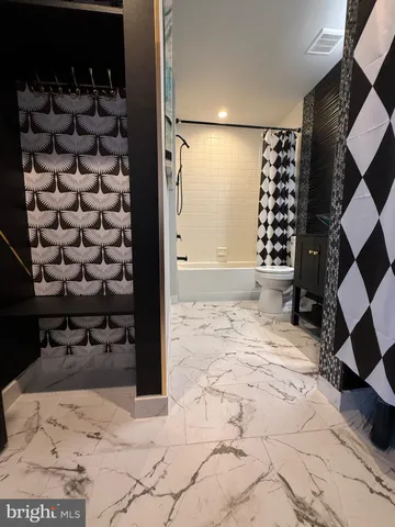 a view of a walk in closet