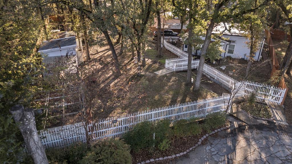 9953 Green Tree Lane Wills Point, TX 75169 - Photo 2 of 39 a backyard of a house with lots of green space