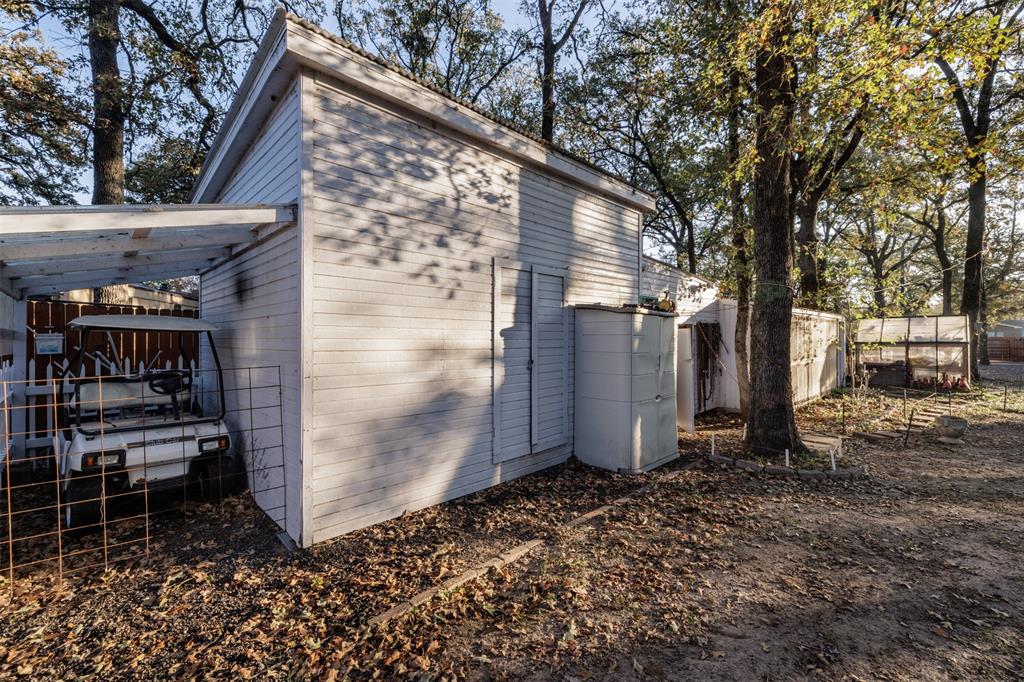 9953 Green Tree Lane Wills Point, TX 75169 - Photo 22 of 39 a backyard of a house with lots of green space