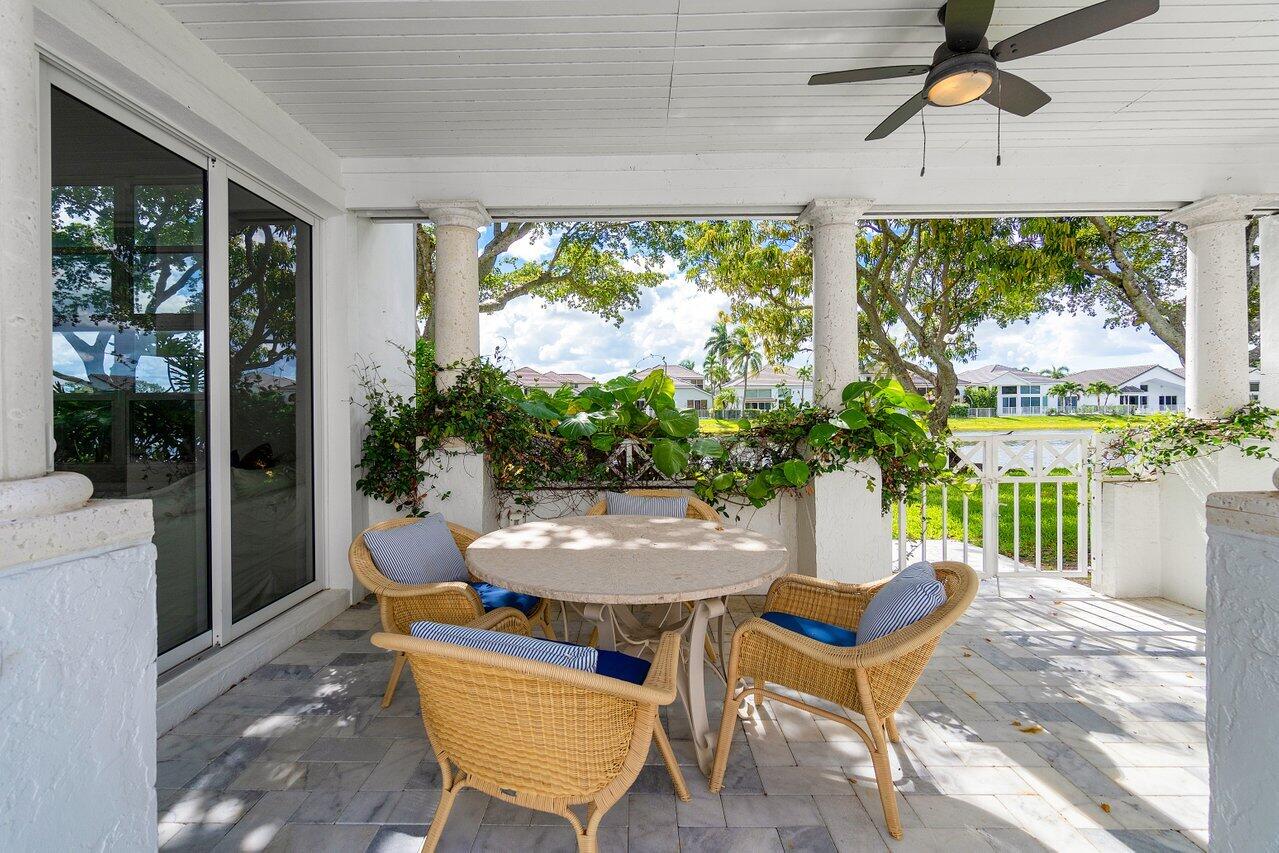 5848 Northwest 39th Avenue Boca Raton, FL 33496 - Photo 24 of 37 a view of a dining room with furniture window and outside view