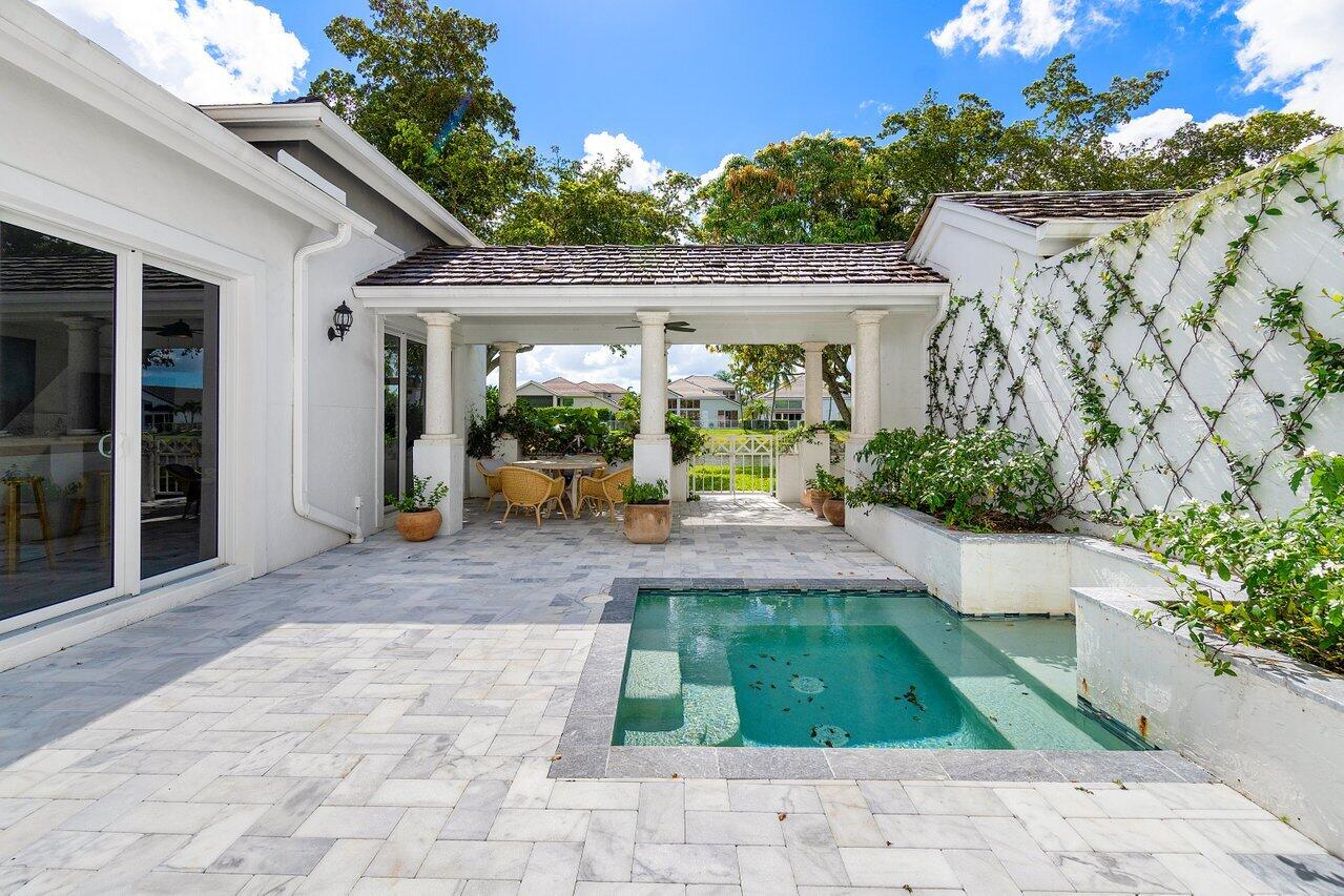 5848 Northwest 39th Avenue Boca Raton, FL 33496 - Photo 27 of 37 a view of outdoor space yard and porch