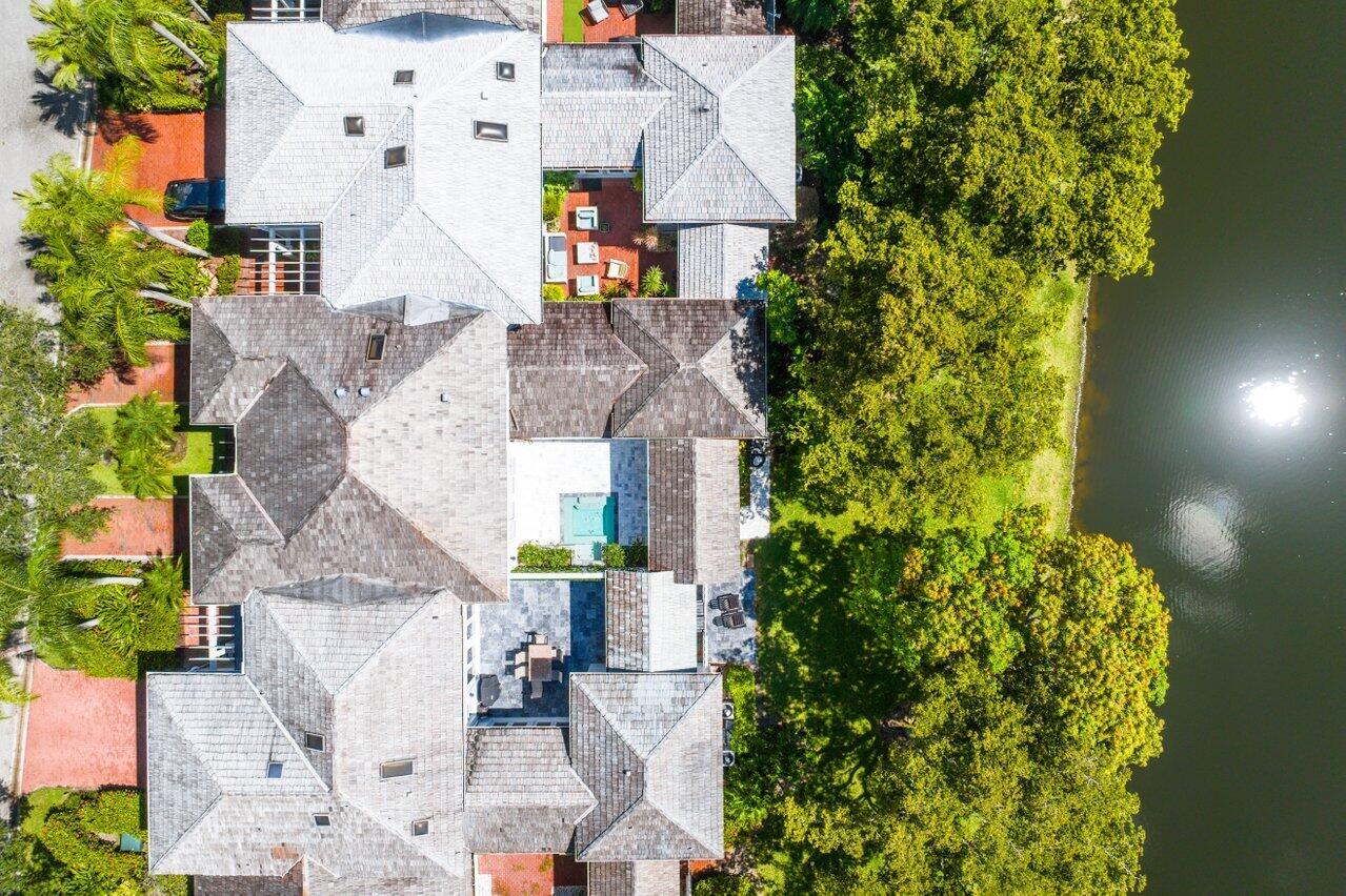 5848 Northwest 39th Avenue Boca Raton, FL 33496 - Photo 33 of 37 an aerial view of residential houses with outdoor space