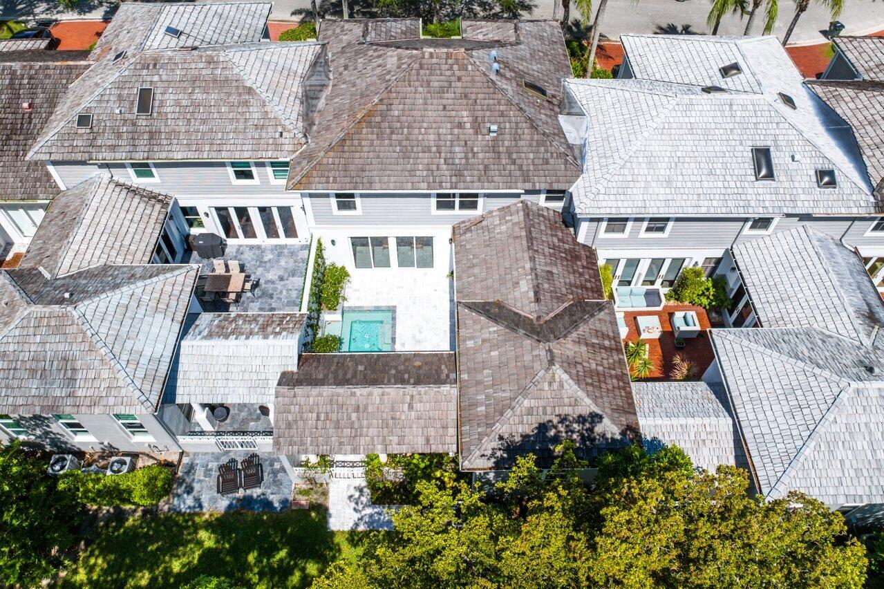 5848 Northwest 39th Avenue Boca Raton, FL 33496 - Photo 34 of 37 an aerial view of multiple houses with outdoor space