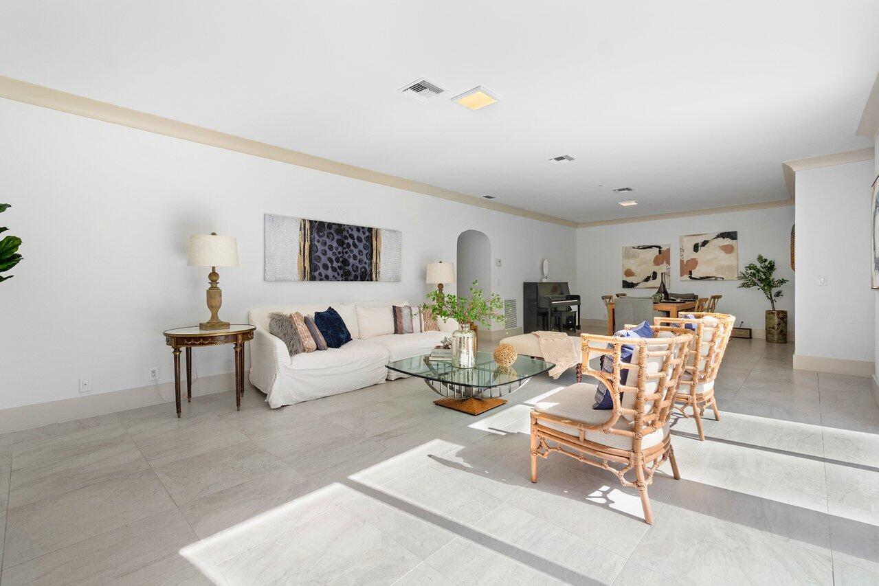 5848 Northwest 39th Avenue Boca Raton, FL 33496 - Photo 7 of 37 a living room with furniture and a wooden floor