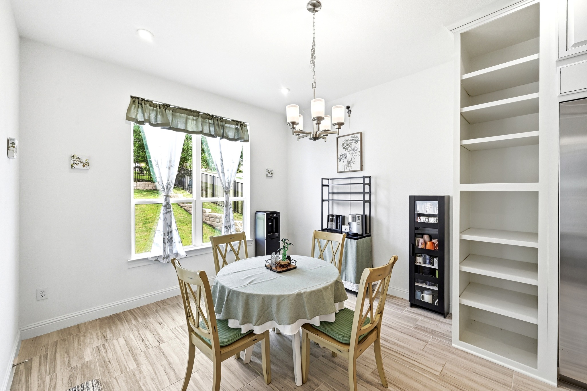 4601 Apollonia Way Leander, TX 78641 - Photo 8 of 40 a view of a dining room with furniture window and wooden floor