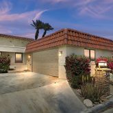 a view of a house with a garage