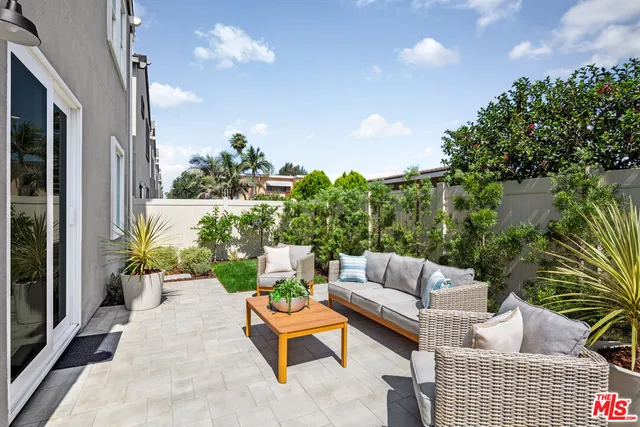 a building outdoor space with patio furniture