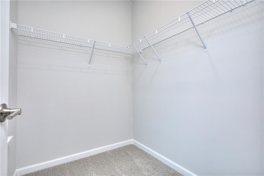 106 Greenview Court Cleveland, GA 30528 - Photo 24 of 29 a view of a room with racks on the wall