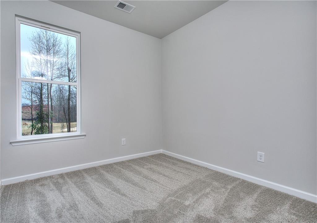 106 Greenview Court Cleveland, GA 30528 - Photo 25 of 29 an empty room with a window