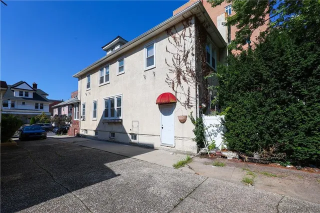 a view of a street with cars