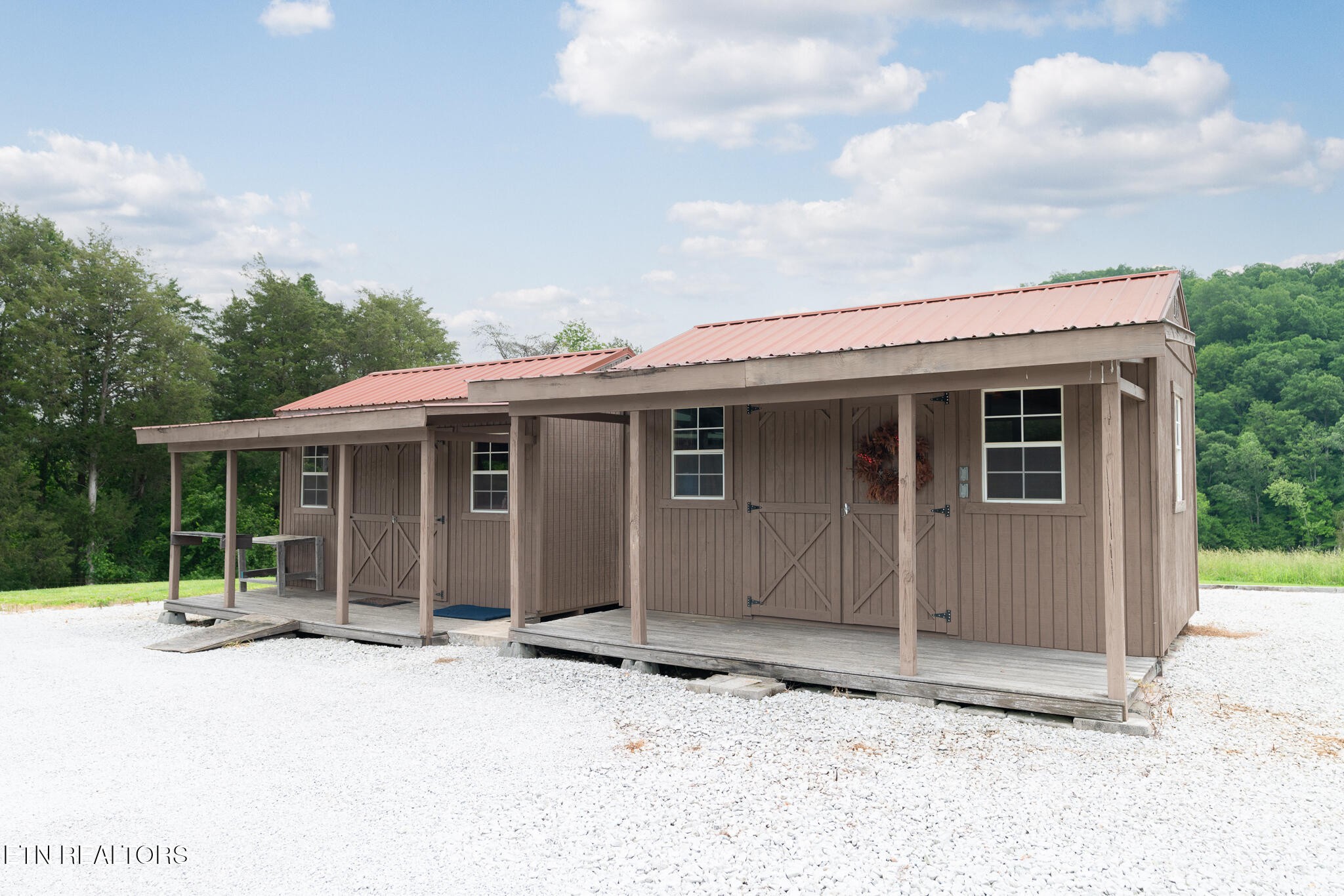 1055 Laurel Bluff Road Kingston, TN 37763 - Photo 24 of 35 a front view of a house with a garden