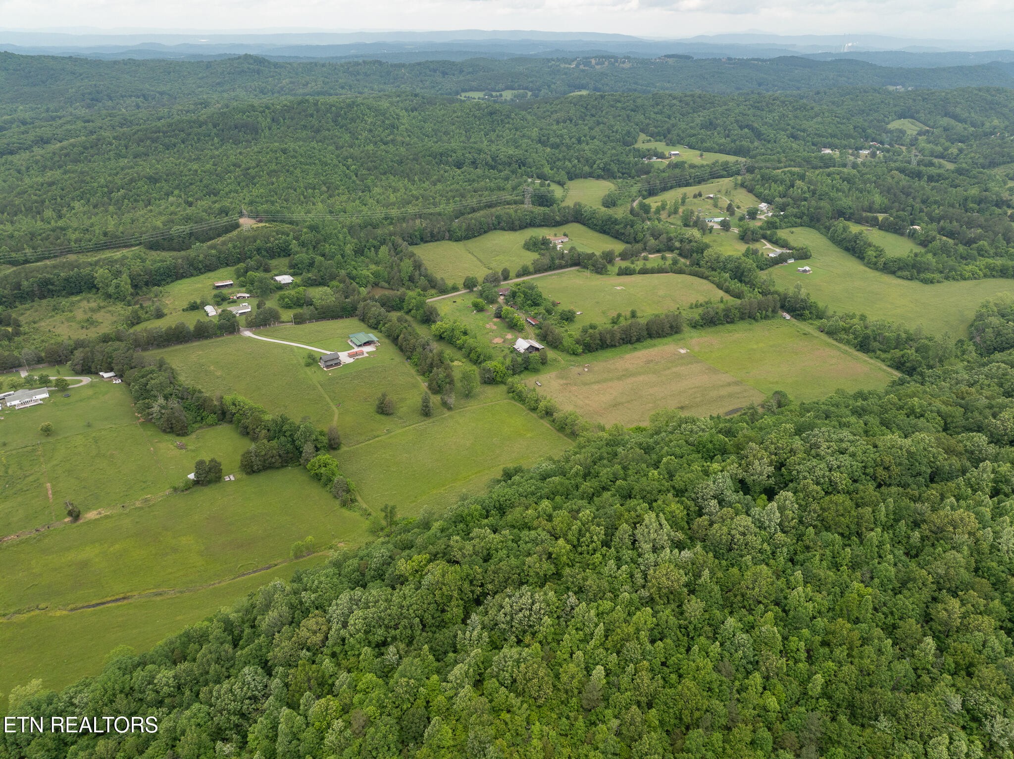 1055 Laurel Bluff Road Kingston, TN 37763 - Photo 32 of 35 a view of a field with an ocean