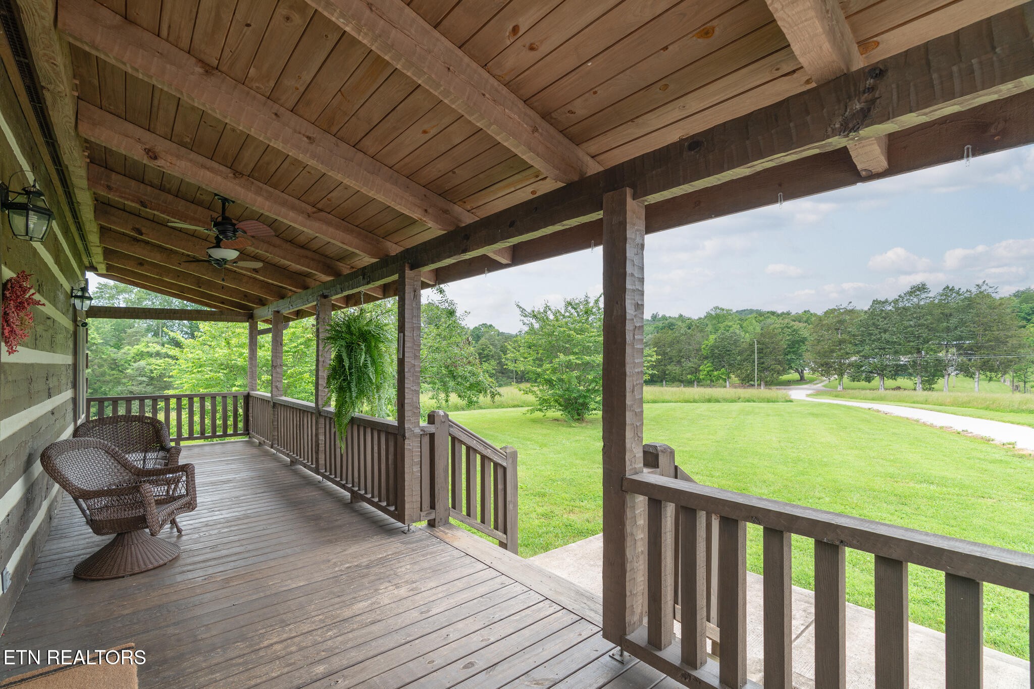 1055 Laurel Bluff Road Kingston, TN 37763 - Photo 4 of 35 a view of a two chairs in the balcony
