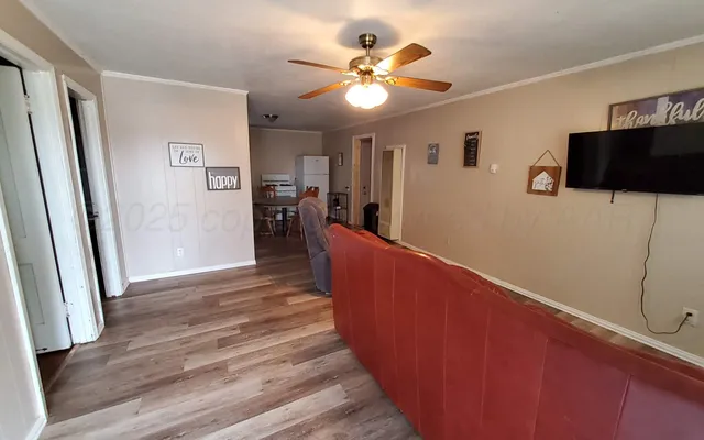 a view of a livingroom with a flat screen tv