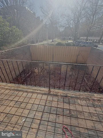 a view of a wooden fence