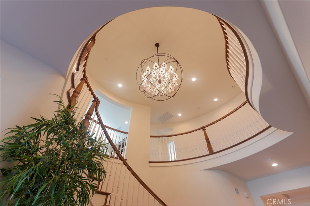 105 Iron Irvine, CA 92618 - Photo 19 of 47 a view of staircase with kitchen view