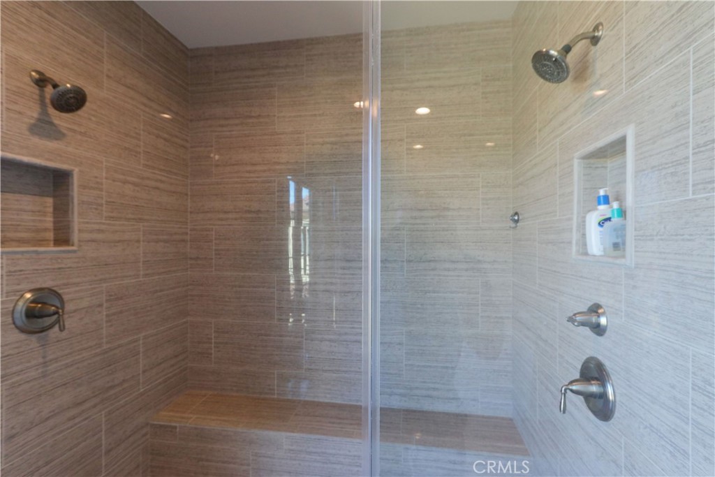 105 Iron Irvine, CA 92618 - Photo 32 of 47 a bathroom with a shower