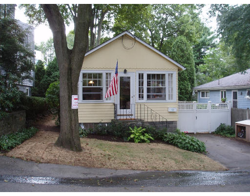 58 Bennett Road Marblehead, MA 01945 - Photo 1 of 1 a front view of a house with garage