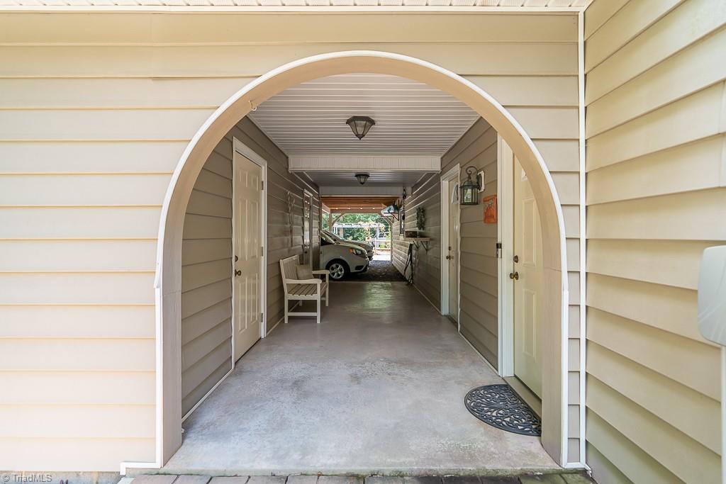 743 Nc Highway Seagrove, NC 27341 - Photo 11 of 50 Covered parking and separate access to lower and upper levels.
