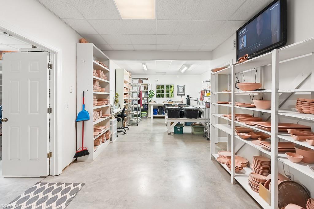 743 Nc Highway Seagrove, NC 27341 - Photo 9 of 50 Clean work space and storage on lower level.