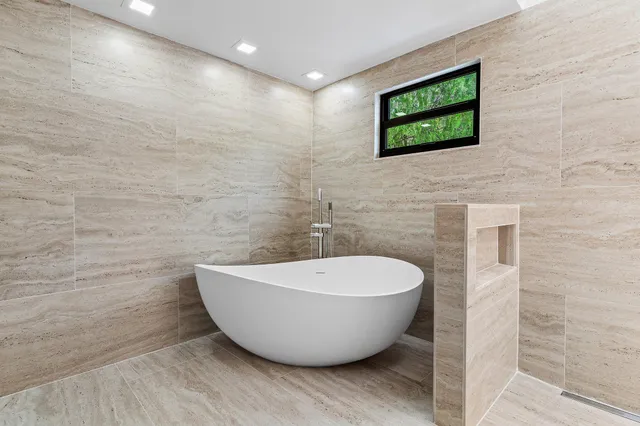 a view of a bathtub in a bathroom