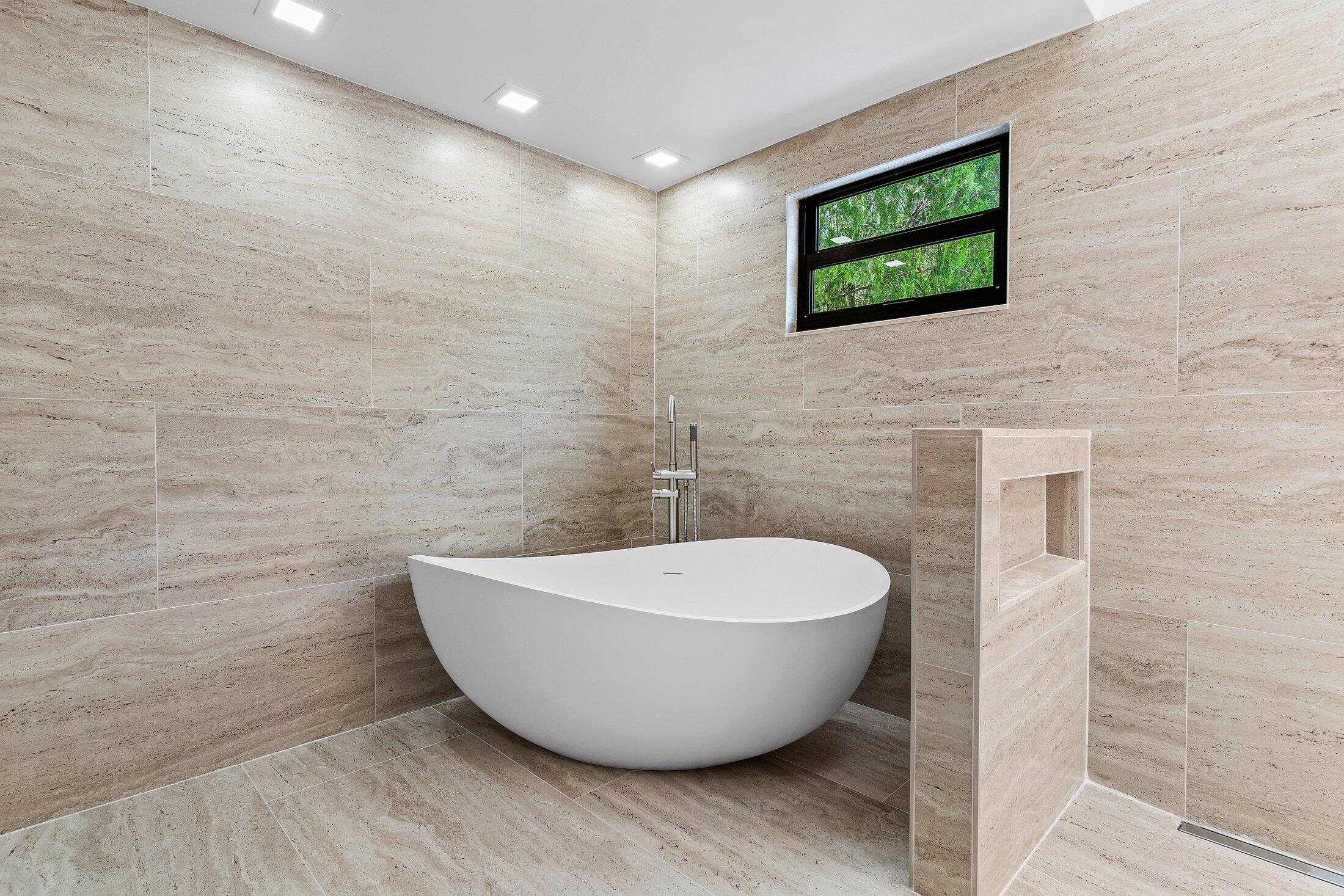 2668 Northwest 41st Street Boca Raton, FL 33434 - Photo 16 of 26 a view of a bathtub in a bathroom