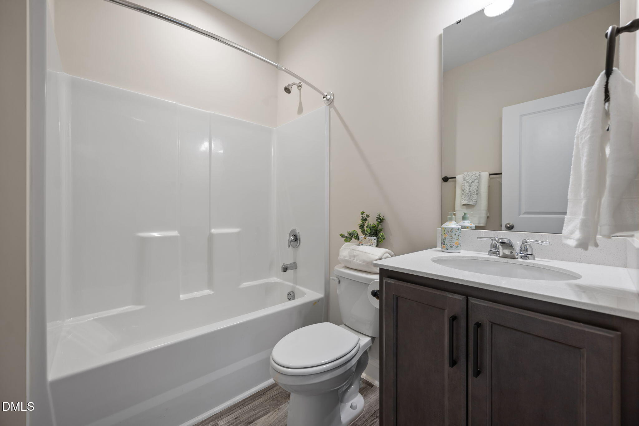 504 Henham Way Zebulon, NC 27597 - Photo 17 of 44 a bathroom with a sink toilet tub and shower