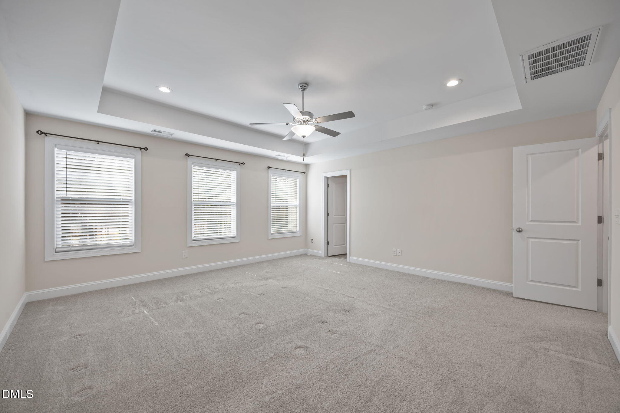 504 Henham Way Zebulon, NC 27597 - Photo 22 of 44 a view of an empty room with a window