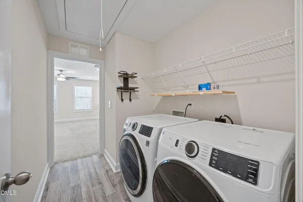 a view of a room with racks on the wall