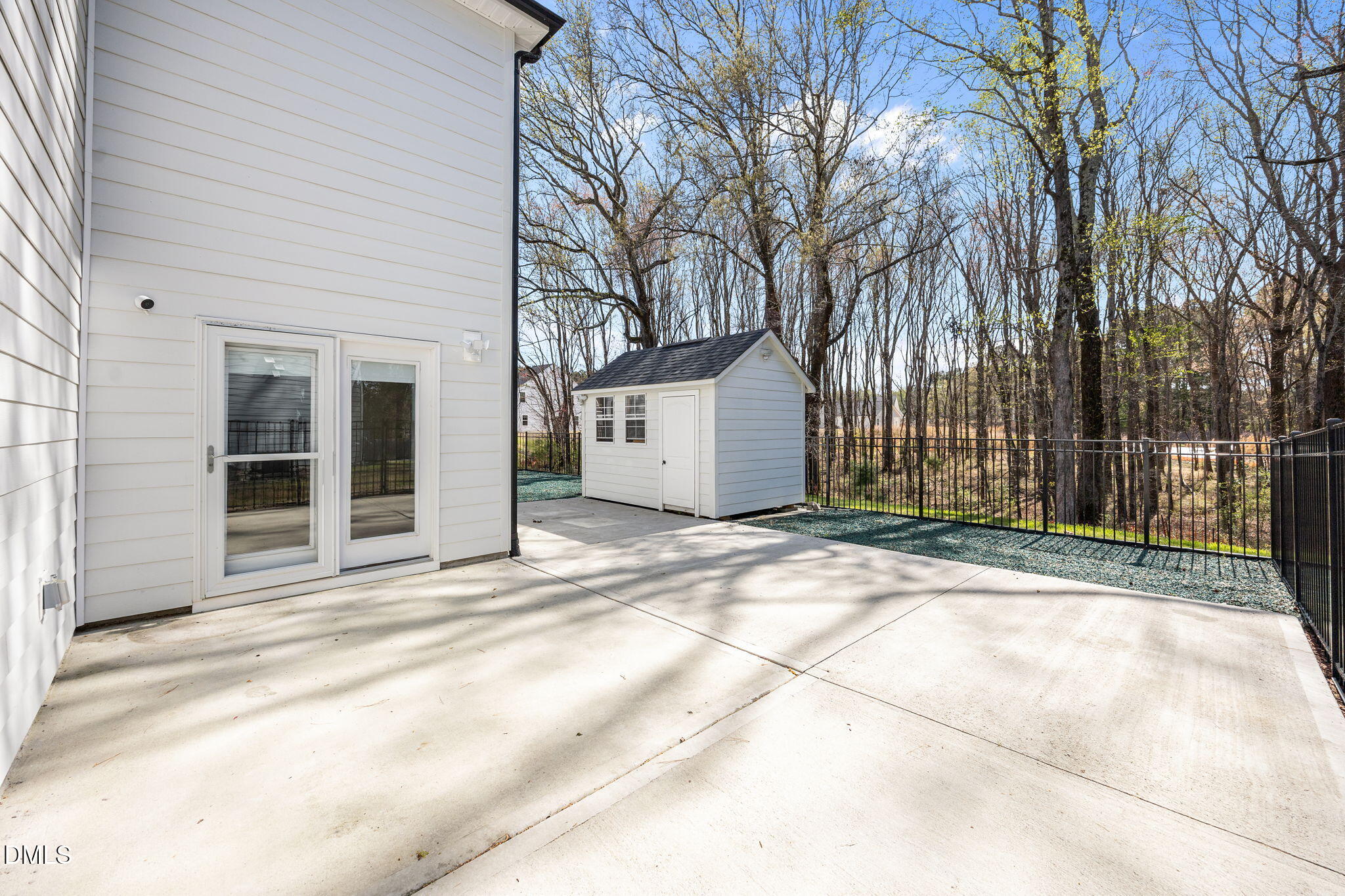 504 Henham Way Zebulon, NC 27597 - Photo 41 of 44 a view of a white house with a large tree