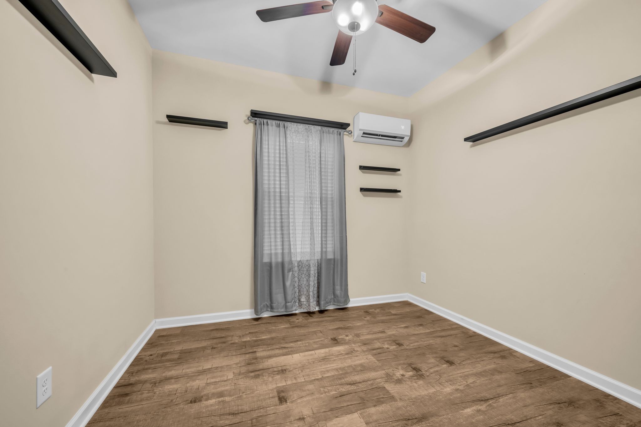 116 Eno Road Dickson, TN 37055 - Photo 11 of 28 an empty room with a empty space and a ceiling fan