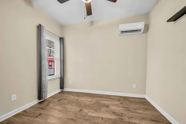 an empty room with windows